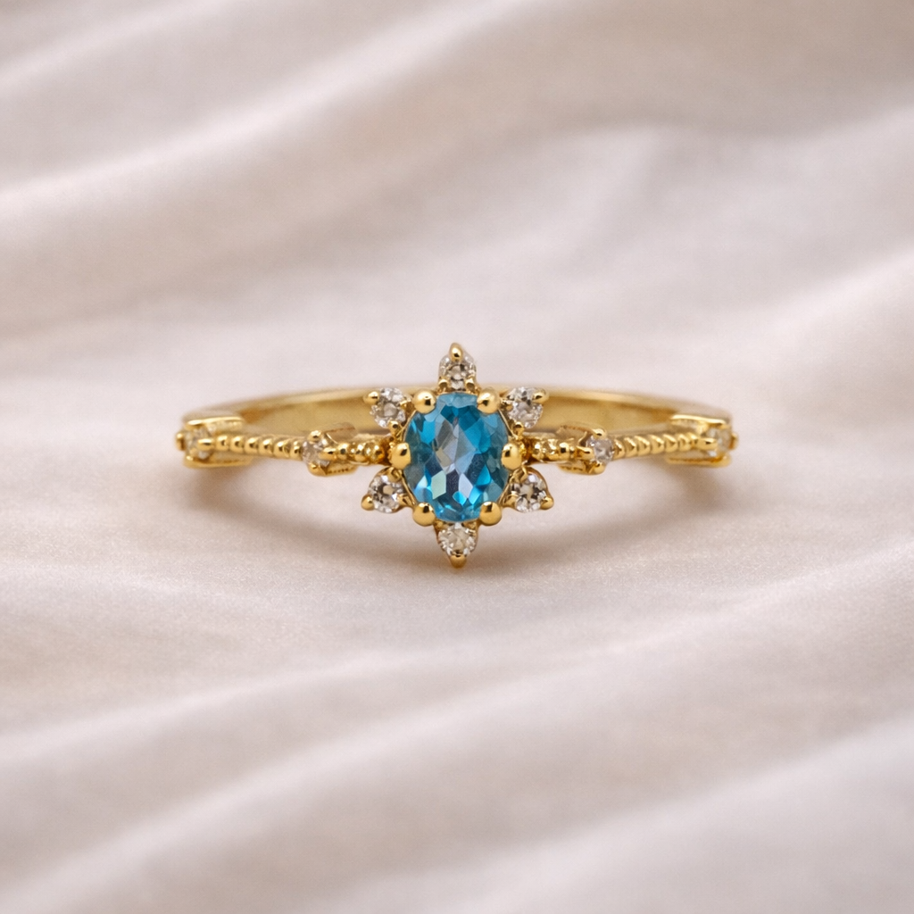 keltakultainen timanttisormus - sininen topaasi