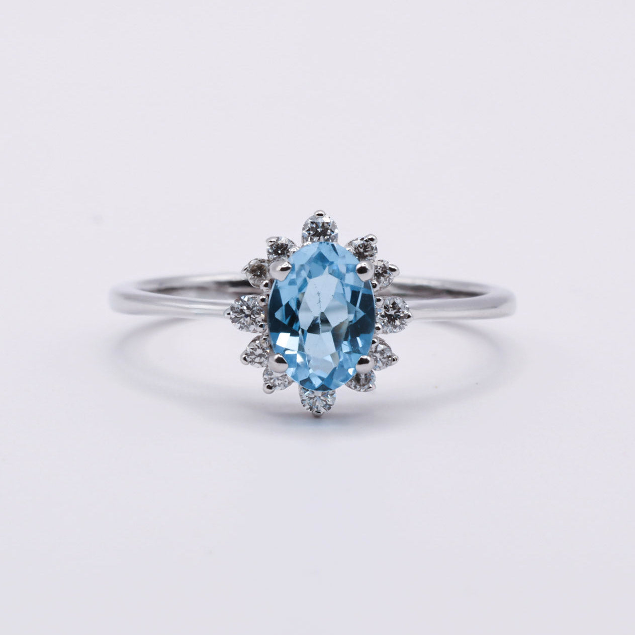 valkokulta - timanttisormus - sininen topaasi