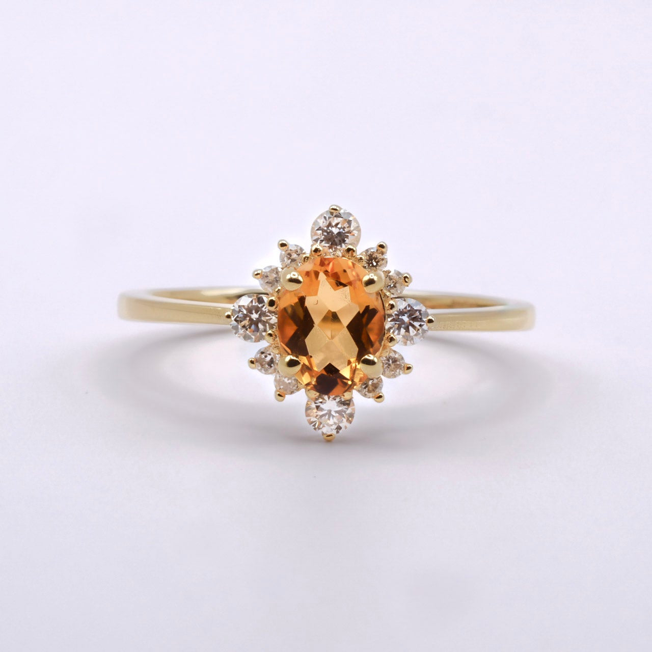 keltakultainen sormus - timantit - keltainen topaasi