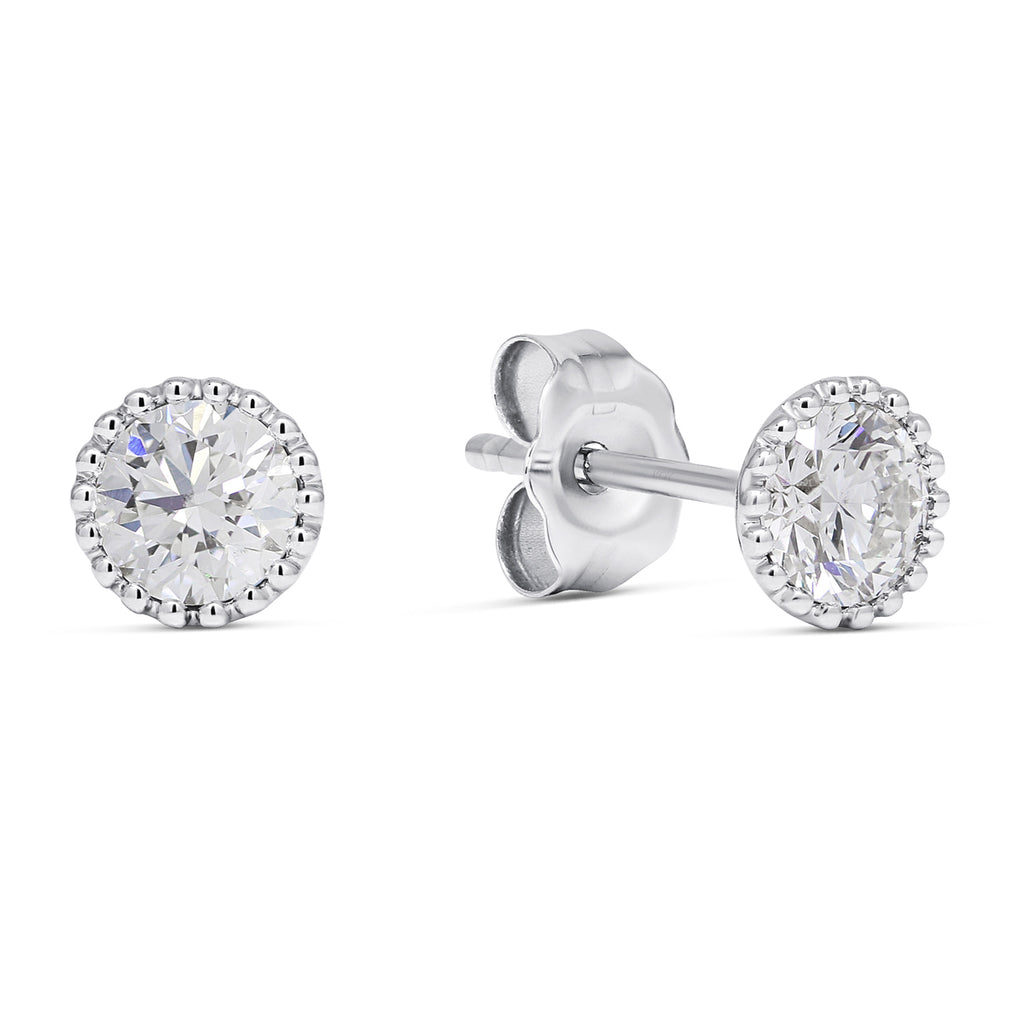 valkokultaiset timanttikorvakorut