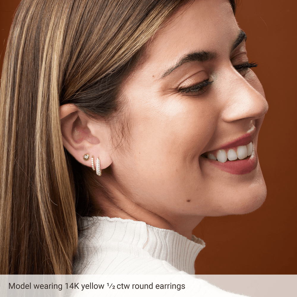 valkokultaiset timanttikorvakorut